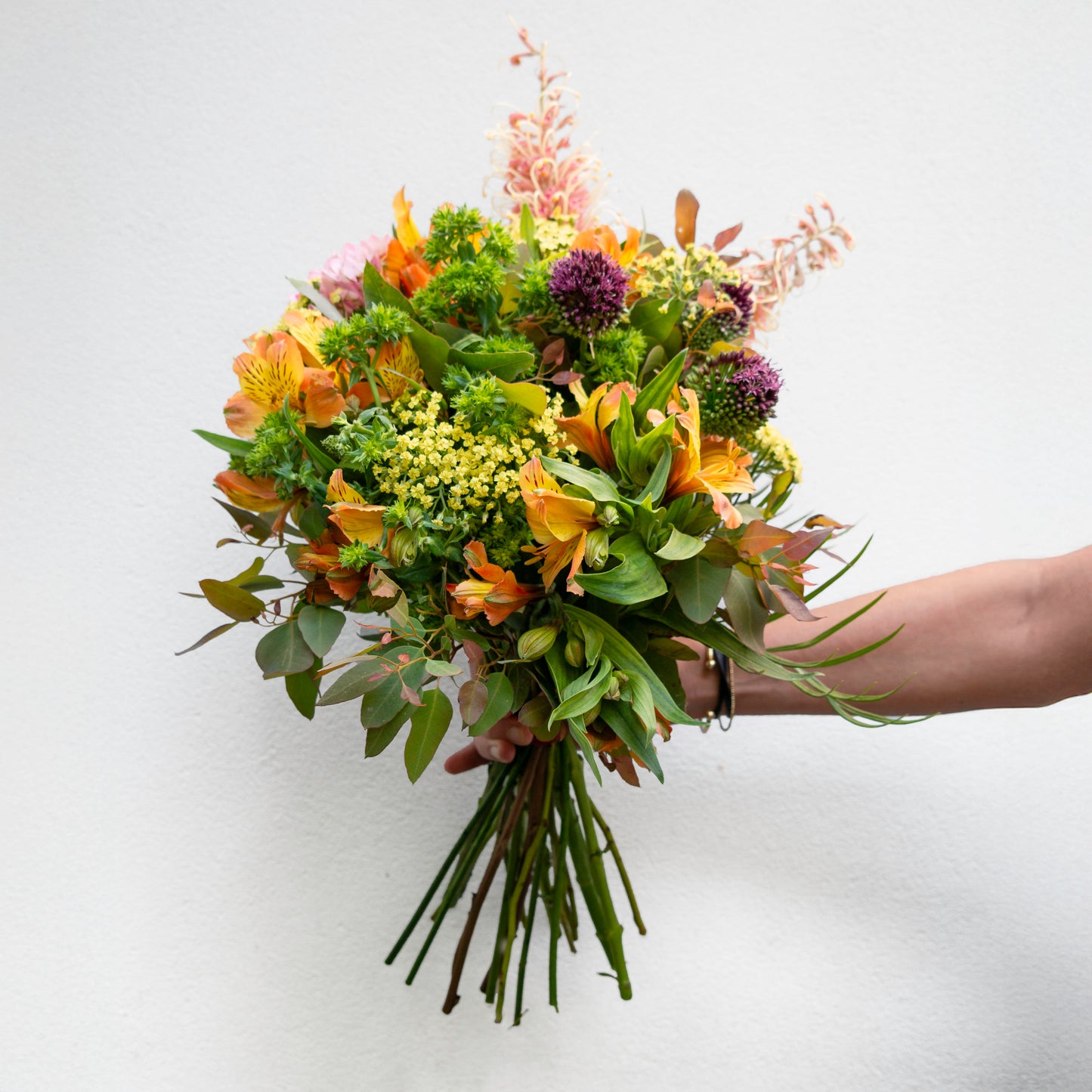 זר כתום עם נגיעות בורדו, צהוב וירוק